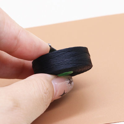 Accesorios de la máquina de coser de poliéster de hilo unido para la caja de almacenamiento de bobinas Tex70 V69