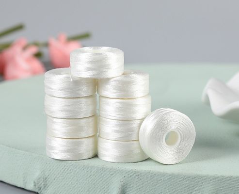 2 cm de diámetro bordado hilo de fondo blanco sin borde tipo L 75D/2 Shuttle Core Coser Prefundido Bobbin 6